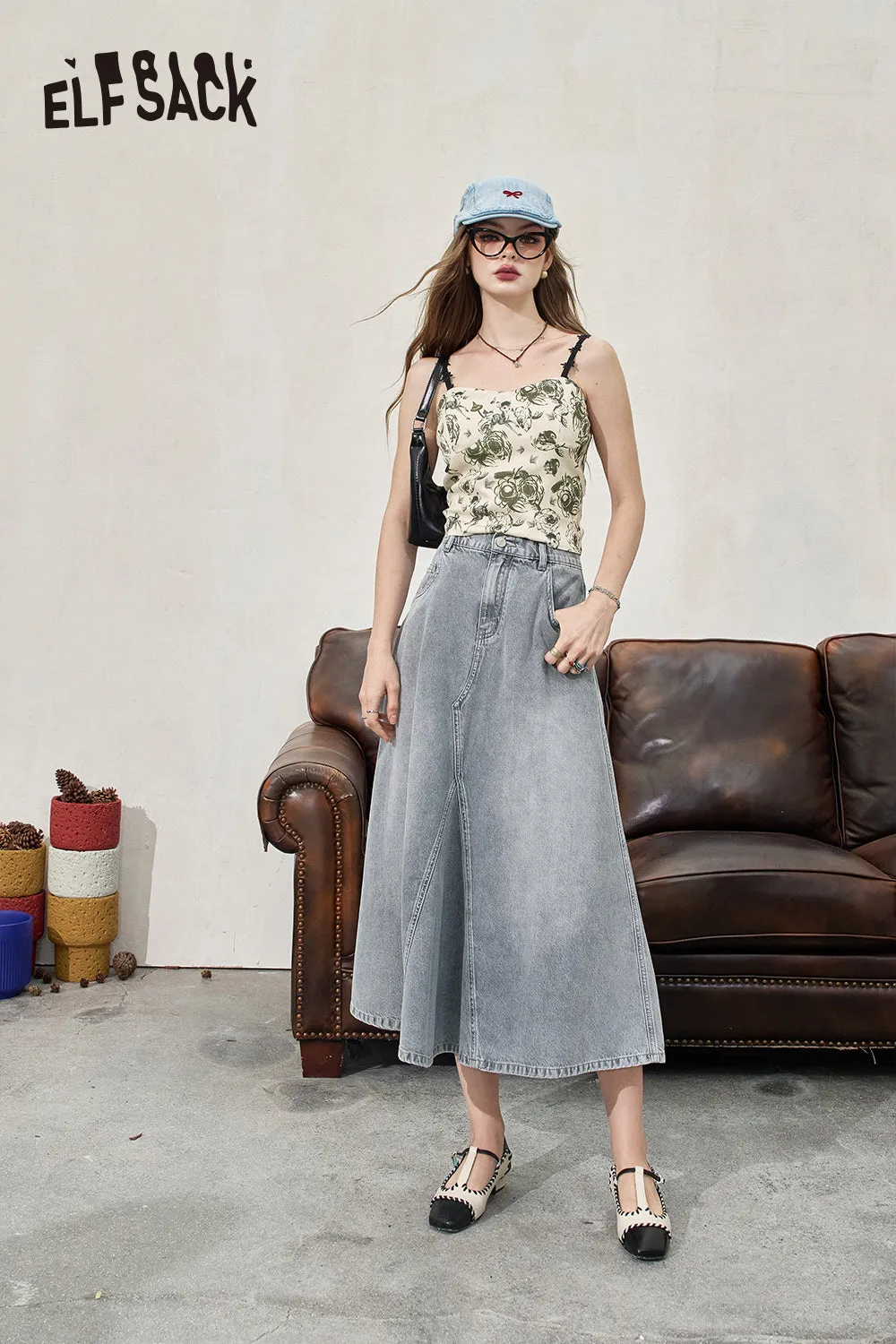 ELFSACK 2024 Summer New Arrivals Light colored high waisted A-line denim skirt for women, irregular large skirt, long skirt